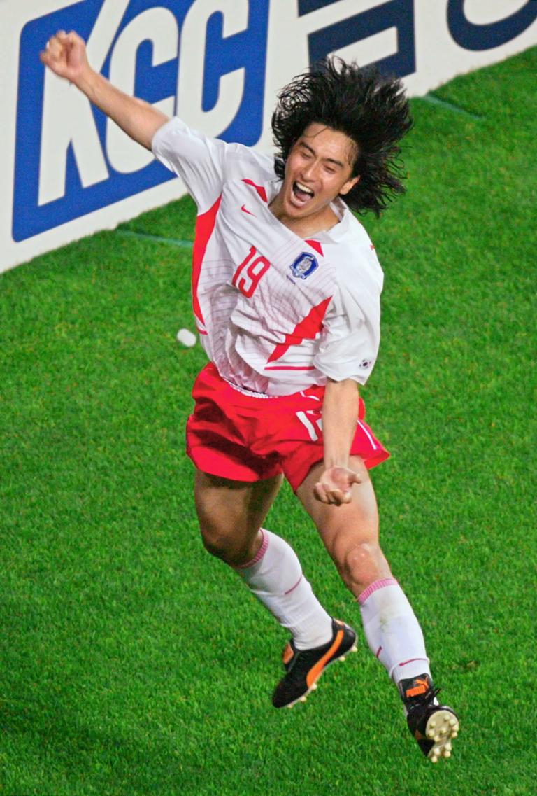 DAEJEON, REPUBLIC OF KOREA:  South Korean midfielder Ahn Jung-hwan jumps in celebration following his 'golden goal' over Italy in extra time of their second round match at the 2002 FIFA World Cup Korea/Japan in Daejeon, 18 June 2002.  South Korea won the match 2-1 in extra time on Ahn's goal and will now meet Spain in the quarter-finals 22 June in Gwangju.    AFP PHOTO/JACQUES DEMARTHON (Photo credit should read JACQUES DEMARTHON/AFP via Getty Images)