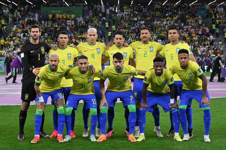 Brazil team players pose for picture before the Qatar 2022 World Cup quarter-final football match between Croatia and Brazil at Education City Stadium in Al-Rayyan, west of Doha, on December 9, 2022. (Photo by NELSON ALMEIDA / AFP) (Photo by NELSON ALMEIDA/AFP via Getty Images)
